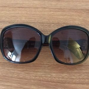 Tod women’s designer sunglasses